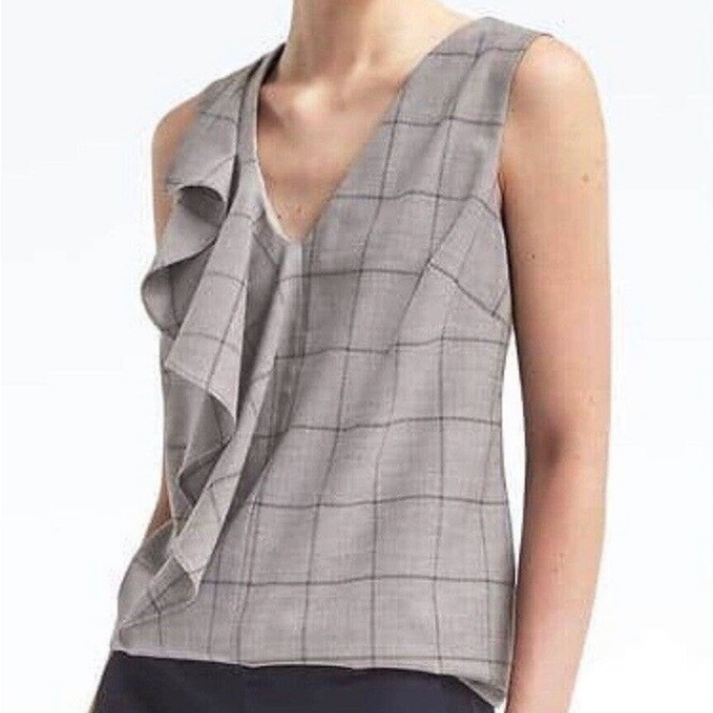 Grey windowpane front ruffle blouse.